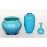 Burmantofts - A small early 20th Century turquoise blue glazed bud vase, shape 410, height 11.