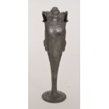 Osiris - A pewter vase modelled as three open mouthed fish above a circular base, height 32cm,