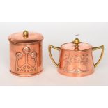 English School - A cylindrical copper string box with stylised flower decoration,