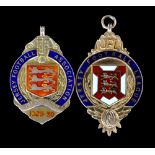 A 9ct hallmarked Jersey Football League enamelled fob dated 1935-36,