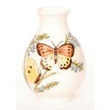 A Walter Moorcroft New Butterfly pattern vase of swollen ovoid form decorated with butterflies and