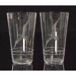 A pair of 1930s clear crystal glass tumblers each engraved with a seagull in flight over waves,