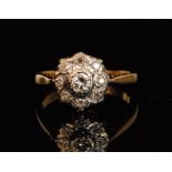 A mid 20th Century 18ct diamond cluster ring,