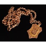 An early 20th Century 9ct rose gold graduated Albert chain and shield shaped fob, weight 47g,