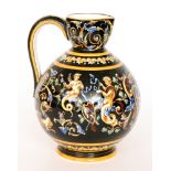An early 20th Century Gien Pottery Renaissance style jug decorated in the with mythical creatures