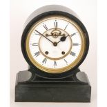 A late 19th Century polished slate cased mantle clock with anchor escapement,