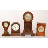 A small Edwardian Art Nouveau inlaid mantle clock together with a similar reeded pillar clock,