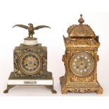 A 19th Century French brass cased mantle clock with circular dial and eight day striking movement