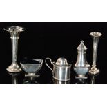 Four items of hallmarked silver a mustard, open salt, pepperette and a bud vase,