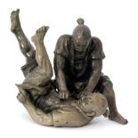 An early 20th Century spelter study of two fighting Japanese men, height 20cm, unmarked.