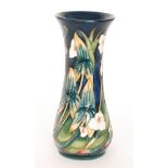 A Moorcroft Pottery vase of slender waisted form decorated in the Elfin Beck pattern designed by