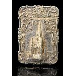 A Victorian hallmarked silver gilt castle top card case of shaped rectangular outline,