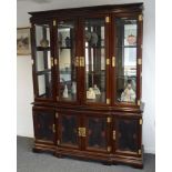 A late 20th Century break-fronted display cabinet in the Chinese taste,