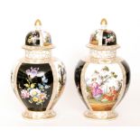 A pair of late 19th Century jar and covers each panel decorated with hand painted Watteauesque