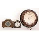 A Smiths circular brown Bakelite wall clock together with two similar mantle clocks (3)
