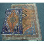 Two Middle Eastern flat woven rugs, the first with four geometric motifs within red, blue,