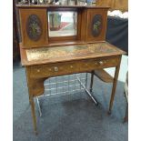 An early 20th Century mahogany writing desk in the Sheraton taste, with painted floral highlights,