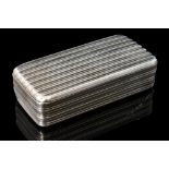 A George III hallmarked silver rectangular snuff box with reeded decoration and gilt interior,