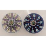 A Perthshire cartwheel paperweight with pink latticino canes to the central millefiori canes all to