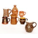 Seven pieces of assorted studio pottery comprising four jugs,