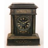 A large Victorian slate mantle clock the black and gilt circular dial flanked by reeded columns