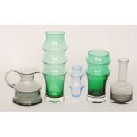 Four pieces of assorted post war Dartington glass designed by Frank Thrower comprising two green