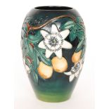 A Moorcroft Pottery vase of swollen form decorated in the Passionflower pattern designed by Sally