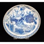 An early 19th Century footed bowl transfer decorated in the blue and white Water Lily pattern,