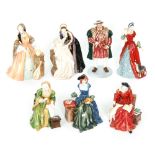 A set of seven Royal Doulton figures modelled as Henry VIII and his six wives from a limited