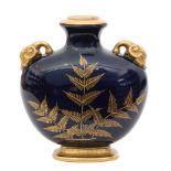 A late 19th Century Royal Worcester Aesthetic pillow vase decorated with gilt ferns and foliage