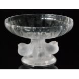 A 20th Century Lalique clear crystal glass comport with a shallow circular fluted bowl mounted to a