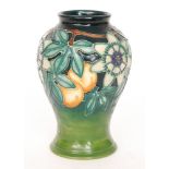 A Moorcroft Pottery baluster vase decorated in the Passionflower pattern designed by Sally Tuffin,