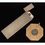 A 1960s 9ct mounted stainless steel cigar cutter of hexagonal outline with textured finish,