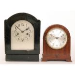 A 1930s Bulle mahogany domed cased electric mantle clock with circular dial,