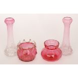 A late 19th Century group of Stourbridge cranberry glass to include a squat vase of hourglass form,