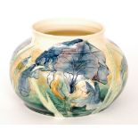 A contemporary studio pottery vase by Katherine Lloyd decorated with large incised blue iris and