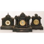 A Victorian black slate mantle clock of domed architectural form and pillared front together with