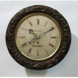 A 20th Century mahogany cased circular wall clock with single fusee movement the silvered dial