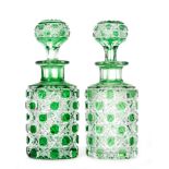 A pair of early 20th Century Stevens & Williams crystal glass scent bottles,