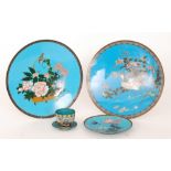 A pair of 19th Century Japanese cloisonne wall chargers one decorated with a bird catching a