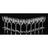 A group of ten later 20th Century crystal wine glasses with cut and polished decoration and repeat