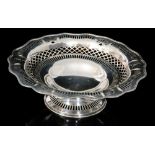 A hallmarked silver tazza of shaped circular outline with pierced palmette and geometric decoration