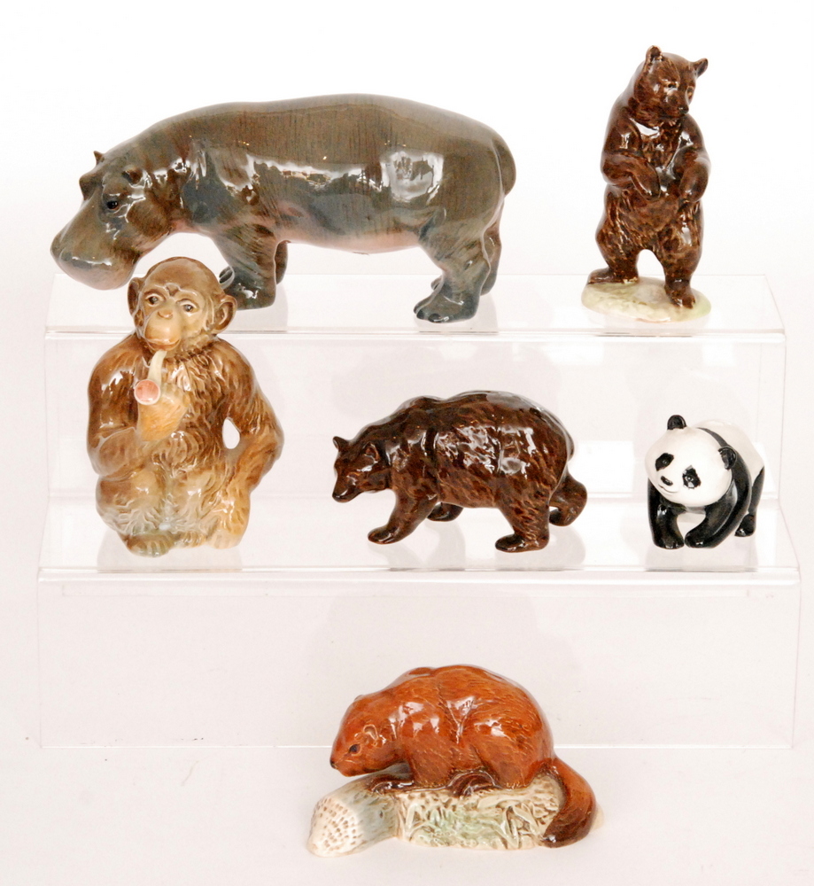 Six assorted Beswick animals comprising a Beaver on Log model 1943, two Bears model 1313 and 1314,