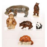 Six assorted Beswick animals comprising a Beaver on Log model 1943, two Bears model 1313 and 1314,