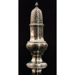 A George III hallmarked silver castor of baluster form and beaded borders with pierced cover with