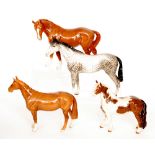 Four Beswick horse comprising a Mare model 976, a Huntsman's Horse model 1484,