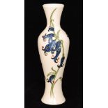 A Moorcroft Pottery vase of slender baluster form decorated in the Bluebell Harmony pattern
