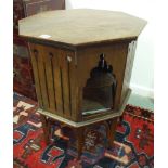 A 20th Century Moorish Arts and Crafts style oak octagonal occasional table,