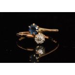 An early 20th Century sapphire and diamond crossover ring,