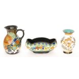 Three pieces of assorted Gouda comprising a floral decorated jug S/D,